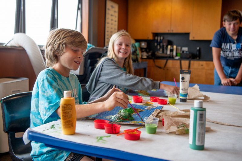 Nature Adventures Summer Campers at the Sea Center creating crafts