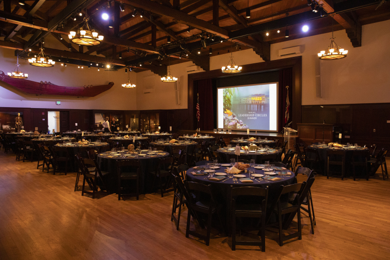 Fleischmann Auditorium ready for an awards dinner with presentation on the big screen